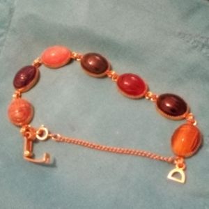 Bracelet small with extension. Multi colors